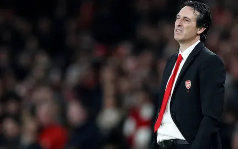 unai emery looking sad over a defeat with arsenal