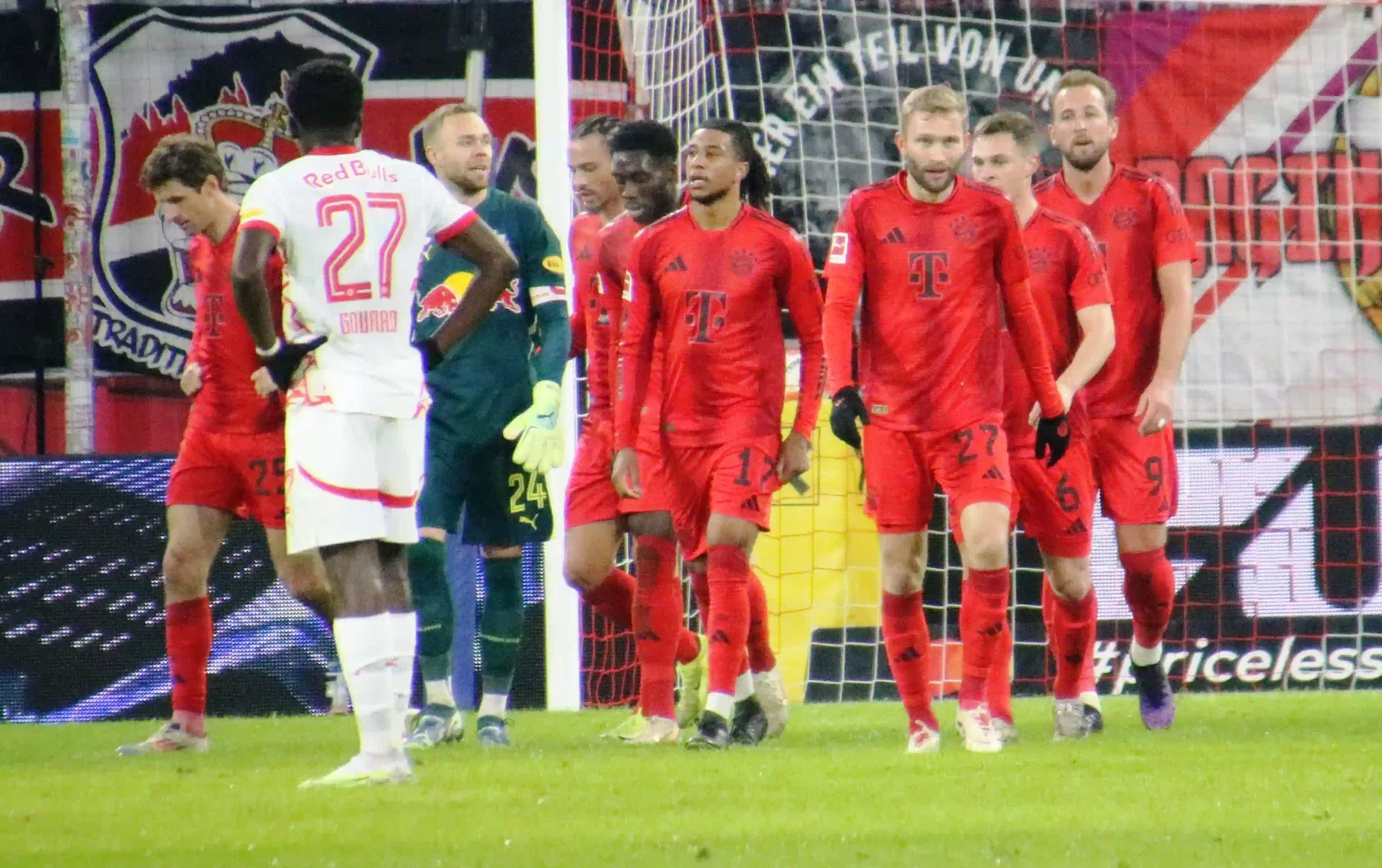 Bayern Munich players walk away from the goal area during a match against Red Bull Salzburg.