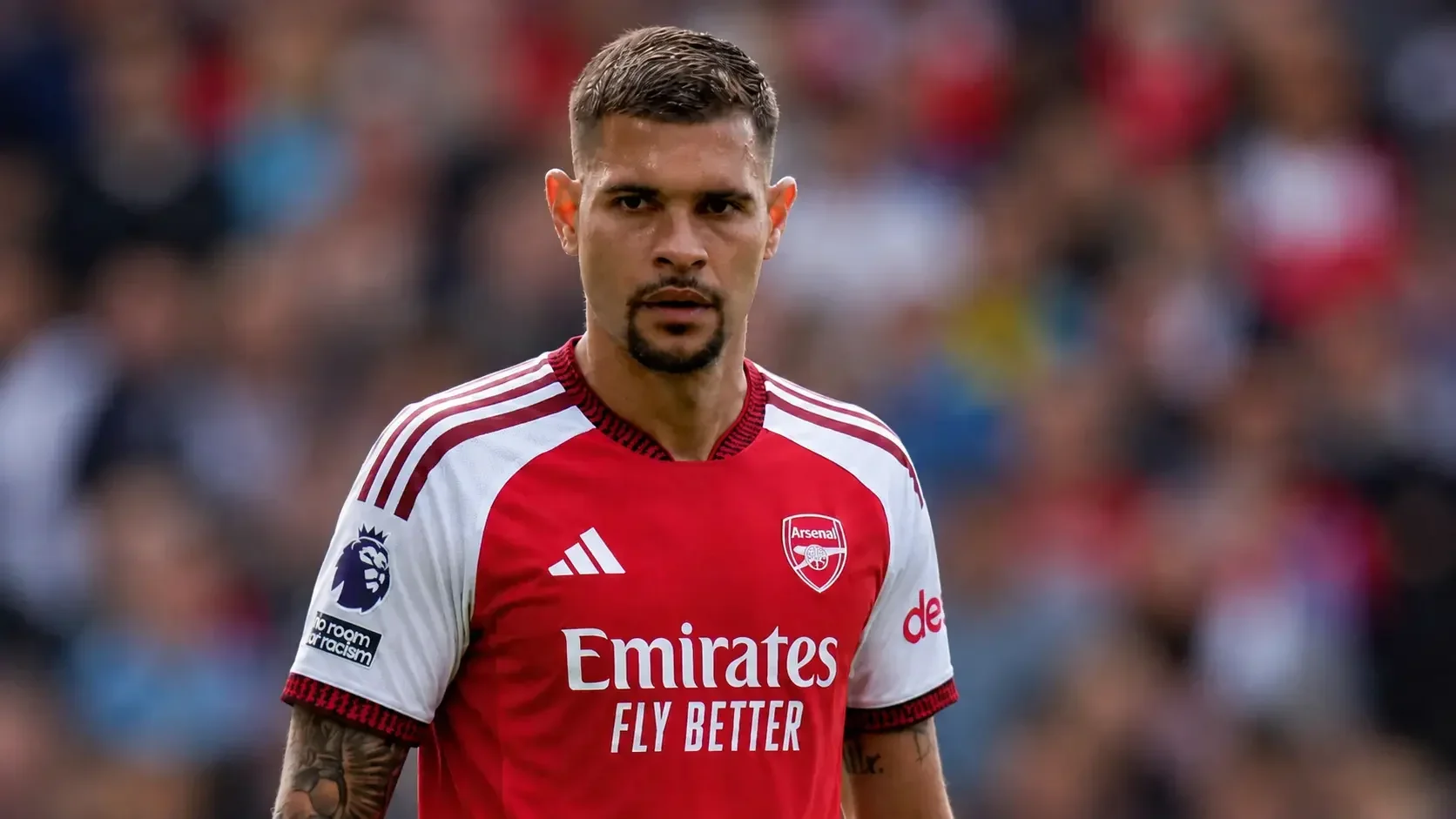 Bruno Guimaraes wearing an Arsenal shirt during a match