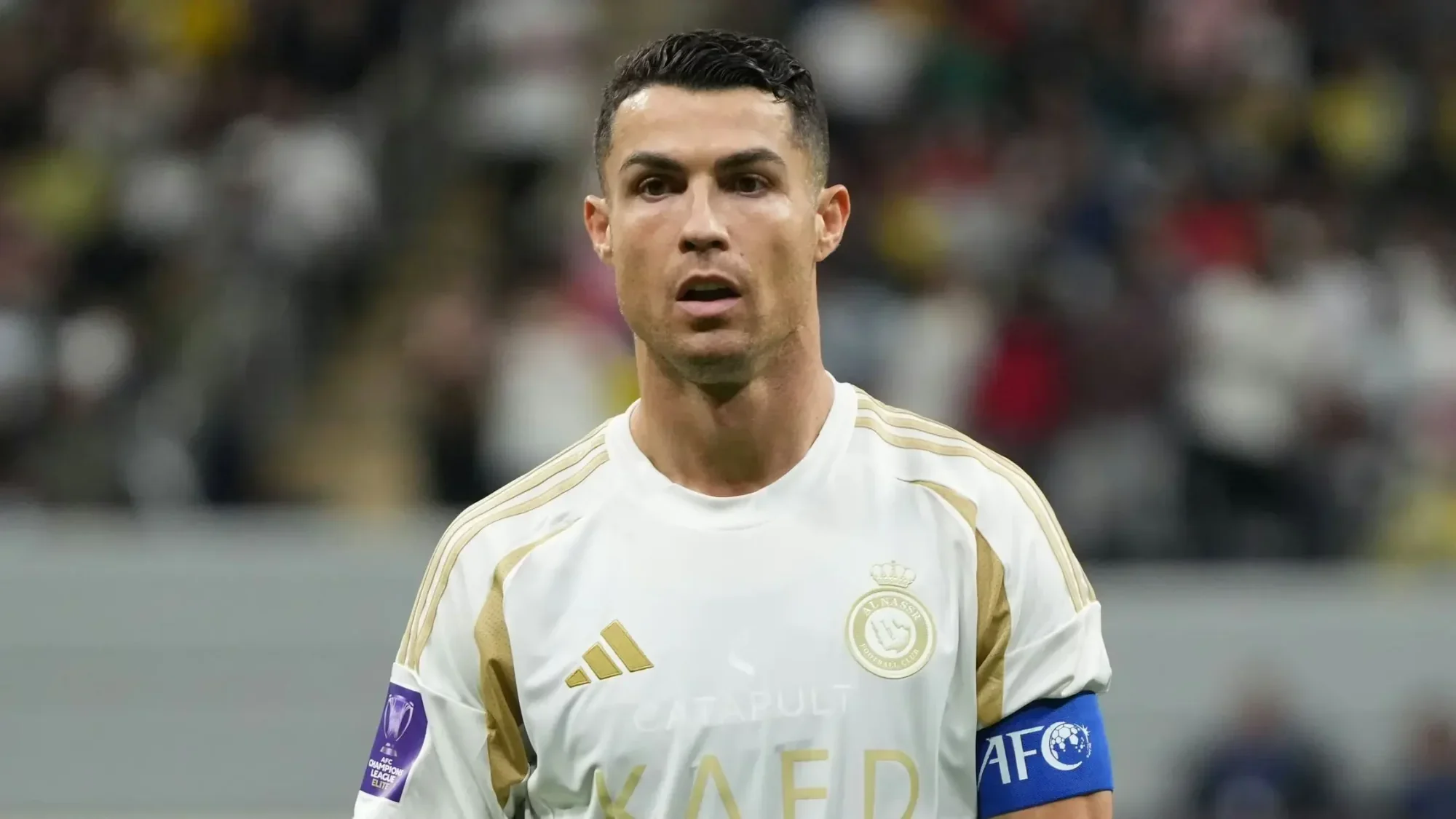 cristiano ronaldo in al nassr kit wearing the captain’s armband during a match