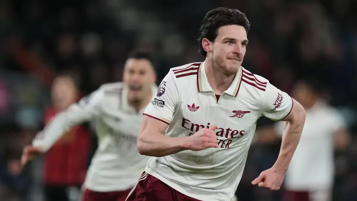 Declan Rice runs in celebration in Arsenal’s away kit during a Premier League match