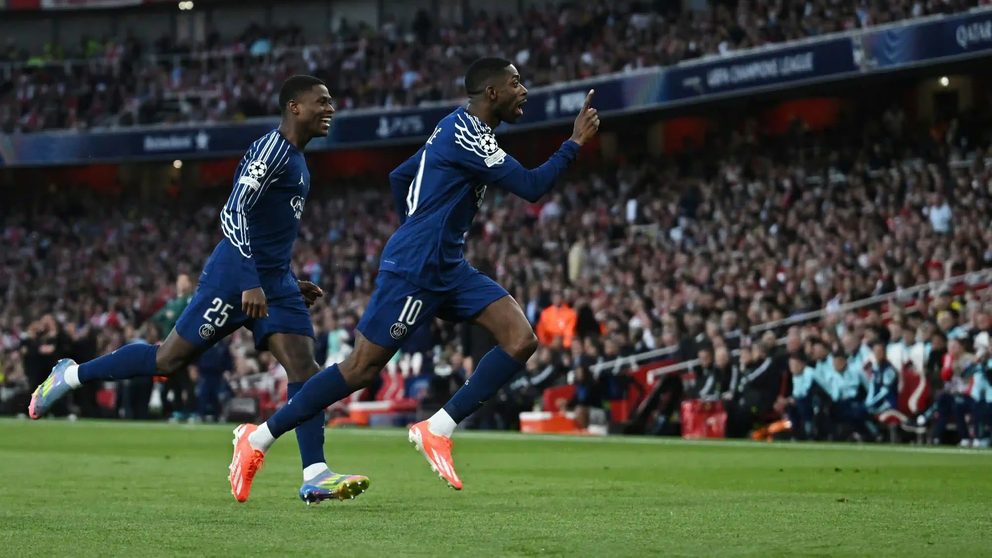 ousmane dembélé celebrates for psg by sprinting with a raised finger during a match