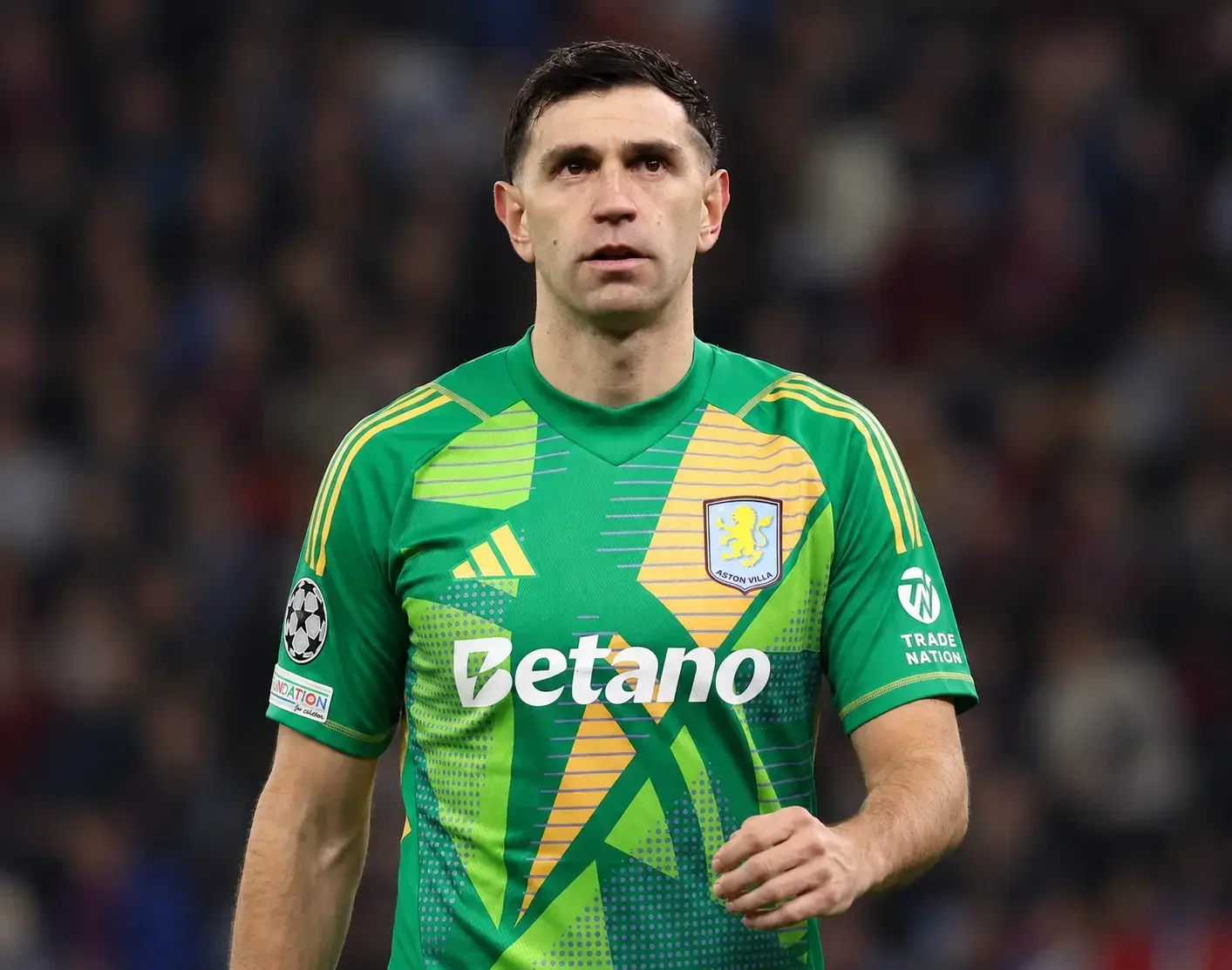 Emiliano Martínez wearing Aston Villa’s green goalkeeper kit during a match