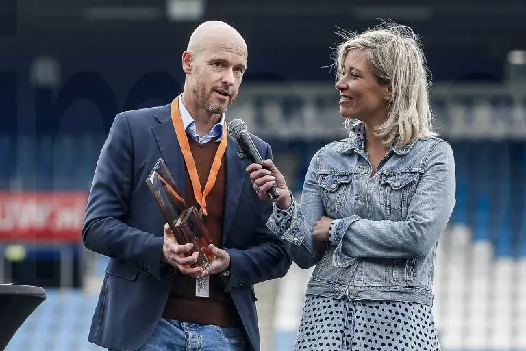 erik ten hag giving an interview with a blonde woman