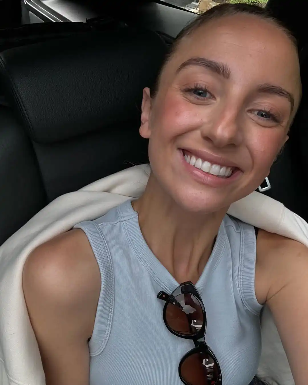 GEROrgie christie smiling for a selfie in the car