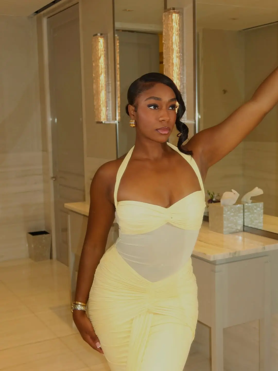 jordeen buckley wearing yellow tight dress