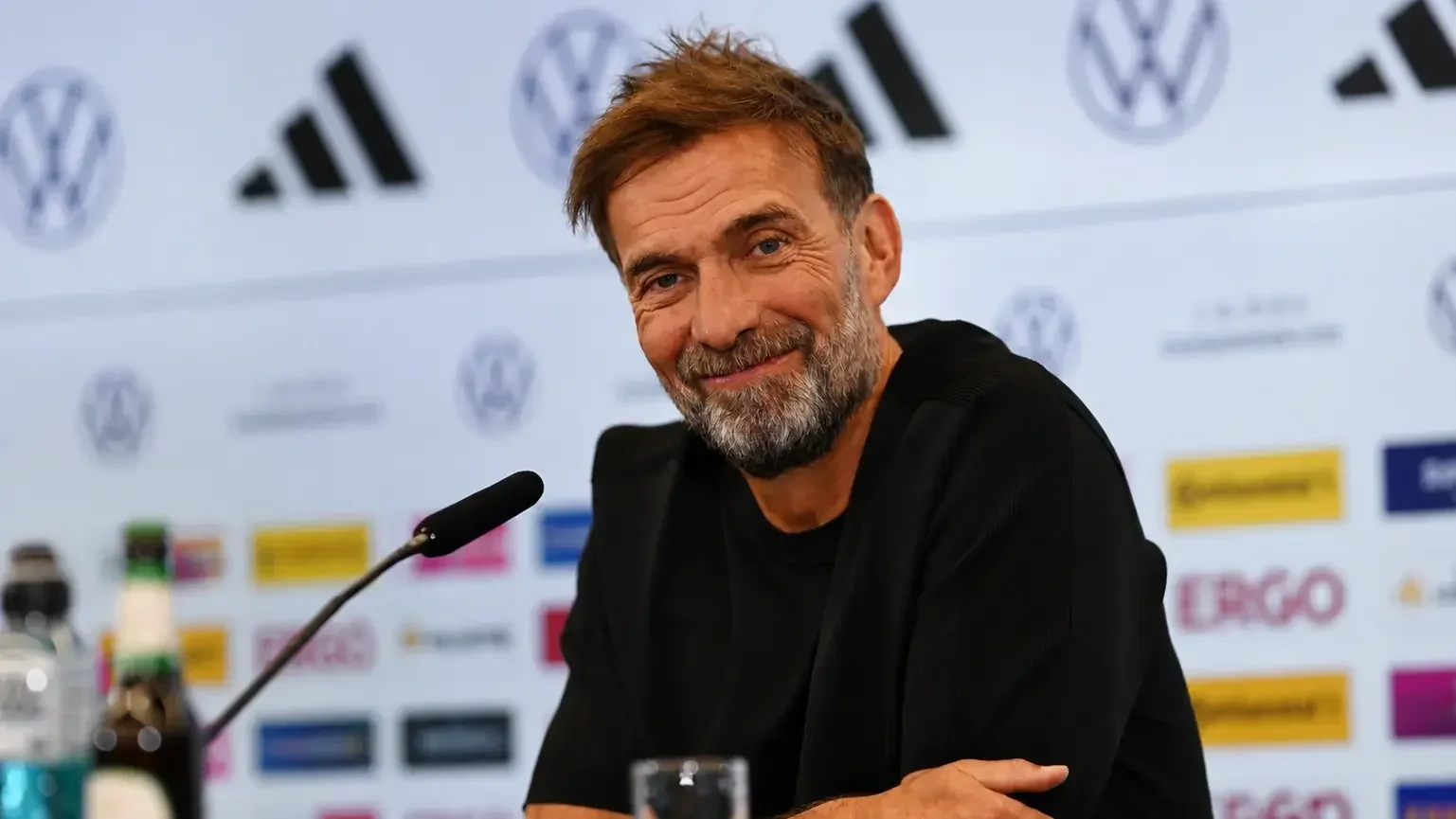 Jürgen Klopp smiling during a press conference