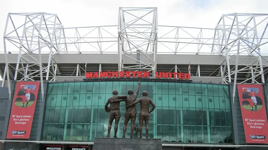 statue of famous man united players infrom ot old trafford