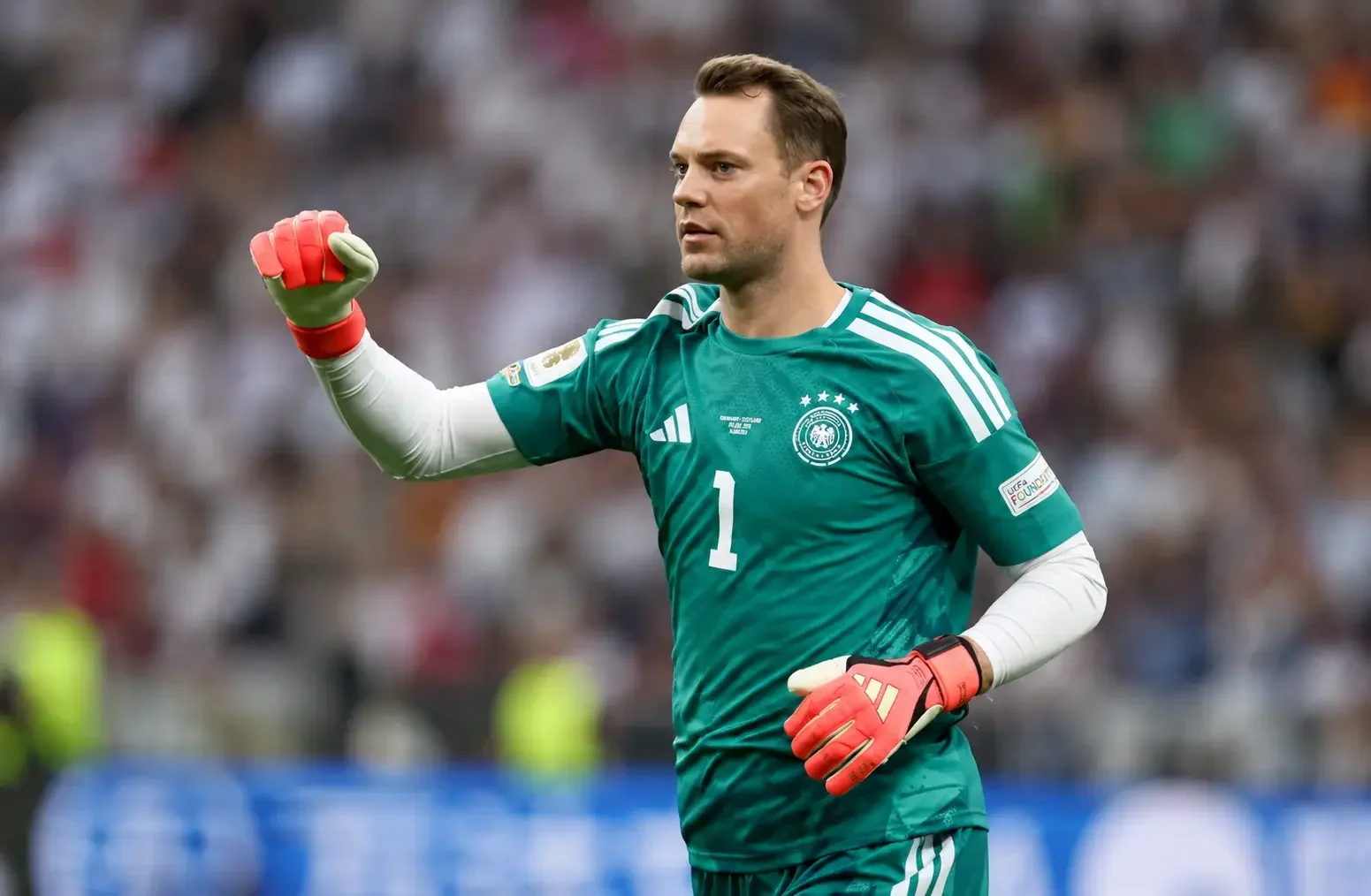 Manuel Neuer in Germany goalkeeper kit during a match