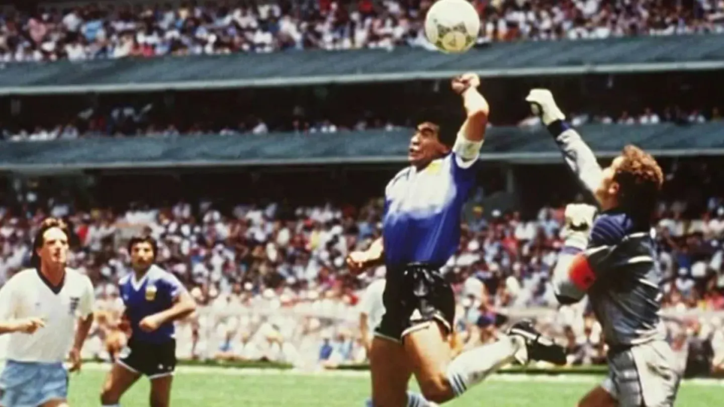 diego maradona scoring his legendary goal the hand of god in 1986