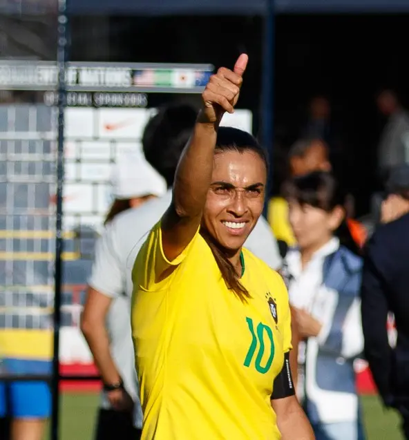 marta the braziliam football player holding her thumb up