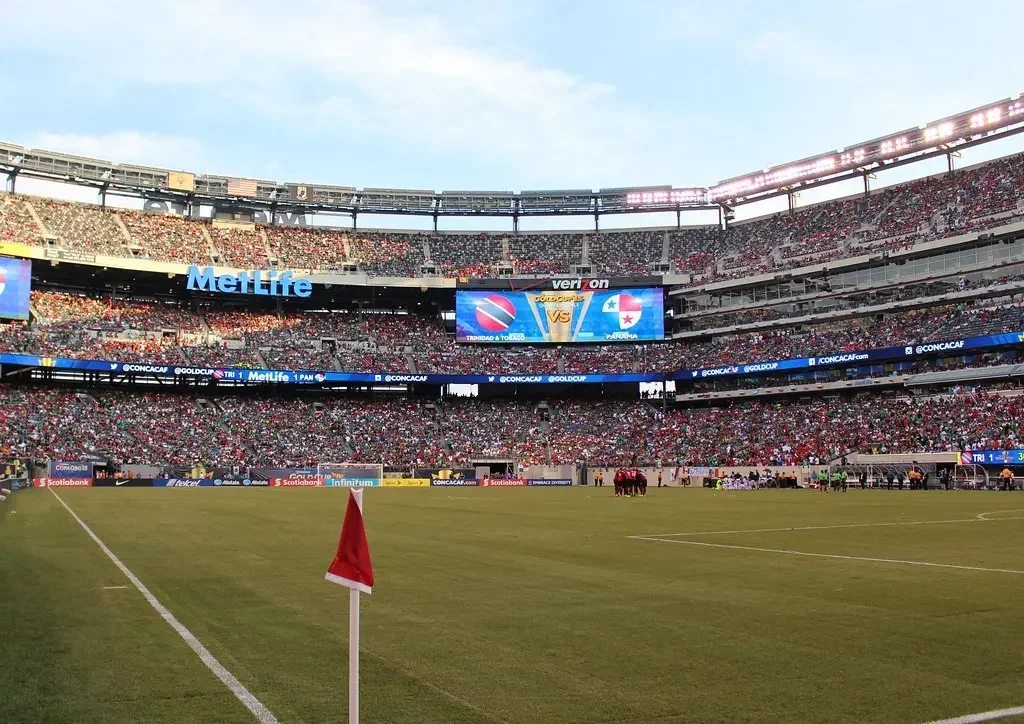 MetLife Stadium packed with fans during a CONCACAF Gold Cup match between Trinidad and Tobago and Panama, viewed from the corner flag.