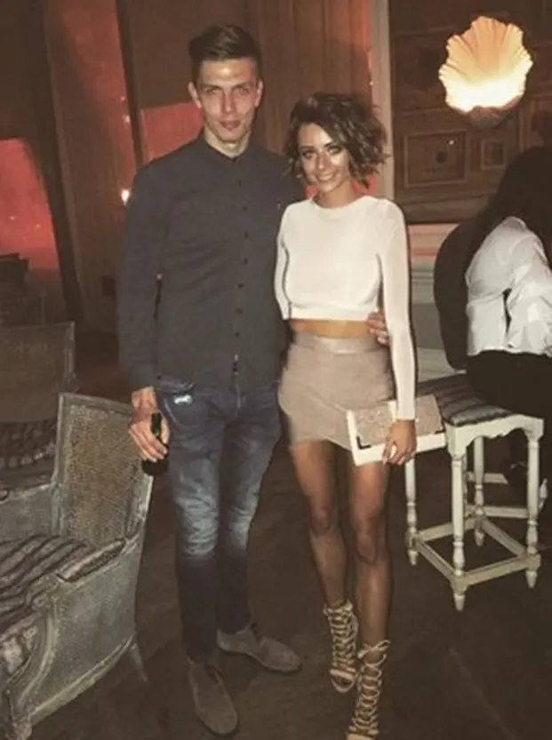 Nick pope and shannon horlock posing for a pic in a bar