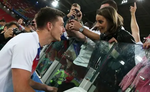 Nick Pope looking at his his girlfriend shannon horlock at the world cup 2018