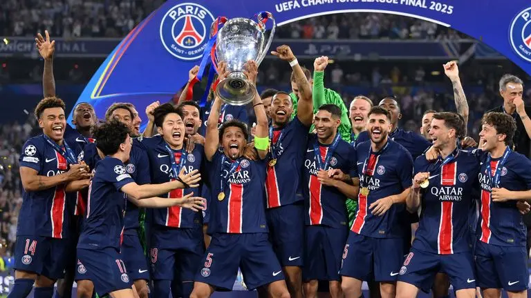 psg lifting the champions league trophy