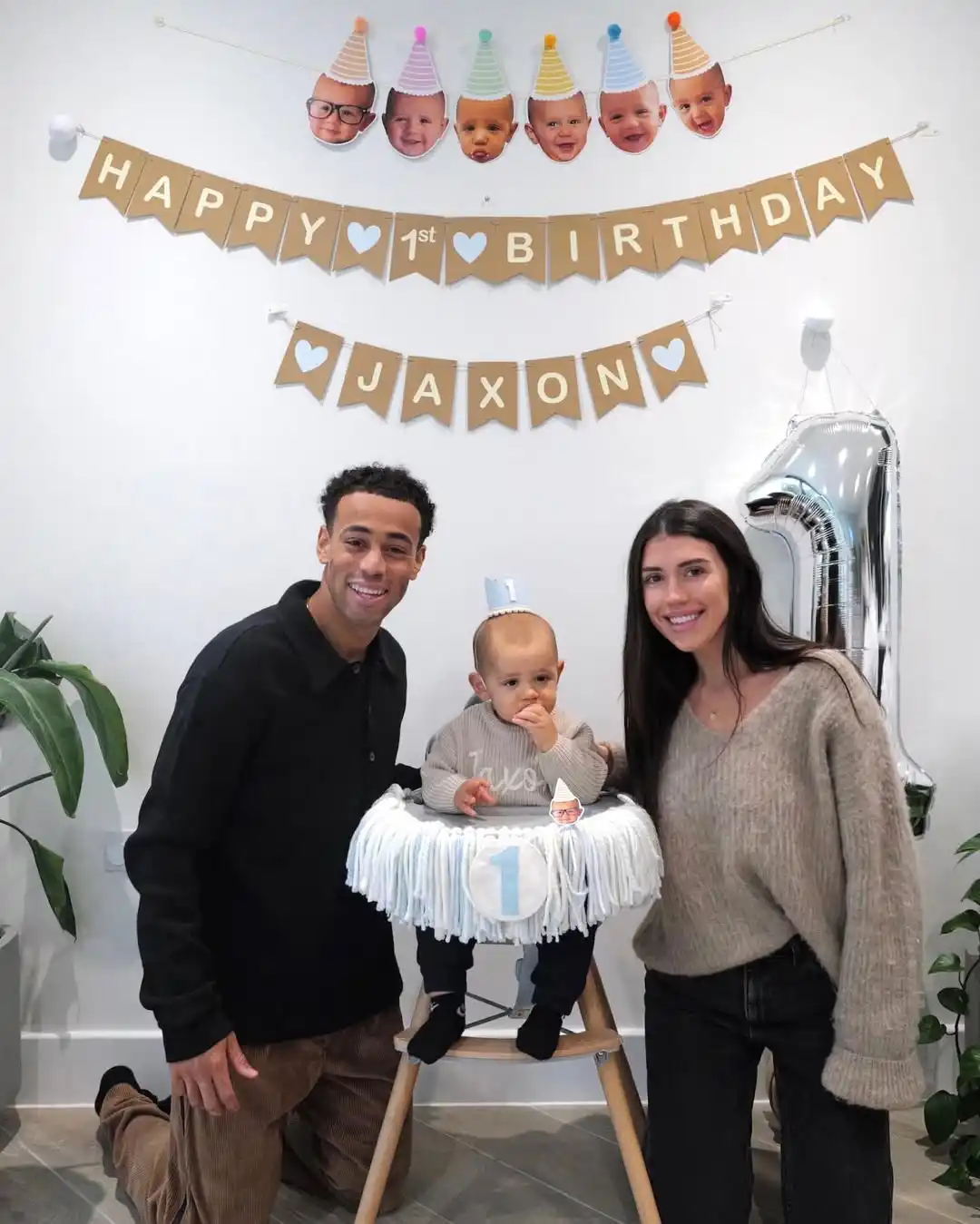 tyler adams and sarah schmidt with their son jaxon at his first birthday