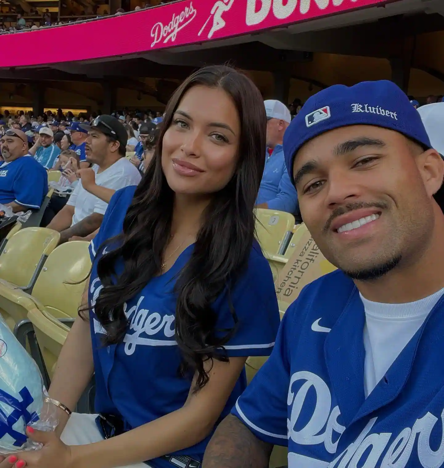 justin kluivert and shanna taihuttu at a baseball game