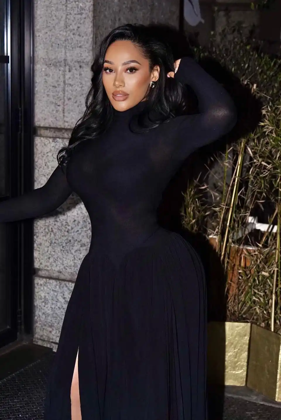 shireen erin lyannda raymond the fiance of jeremy doku wearing a black dress
