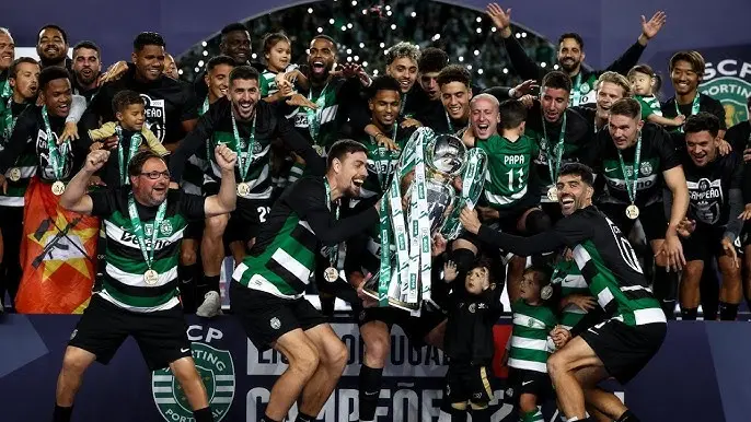 sporting lifting a trophy